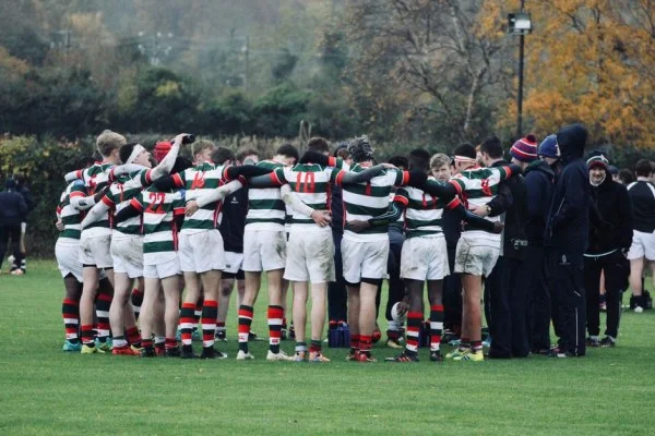rugby team huddle